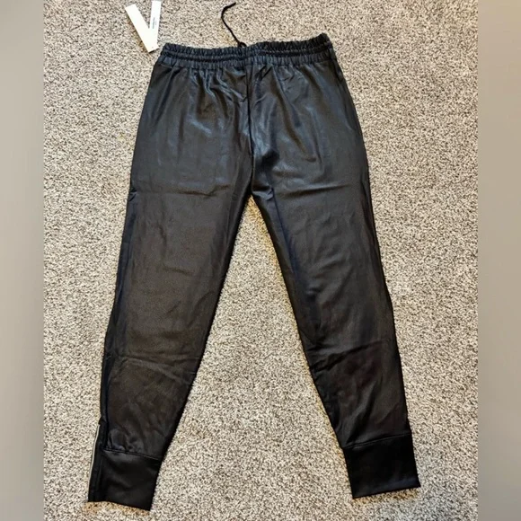Standing Tree Black Joggers with zippers at the ankle
NWT
Never worn. - Picture 5 of 5